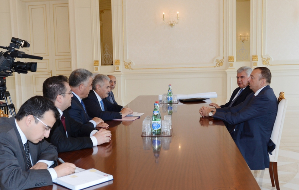 President Ilham Aliyev receives Turkish delegation lead by Transport, Navigation and Communication Minister