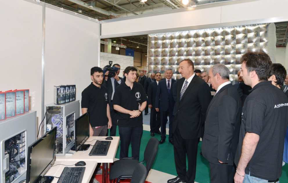 President Ilham Aliyev views BakuTel 2013 Exhibition