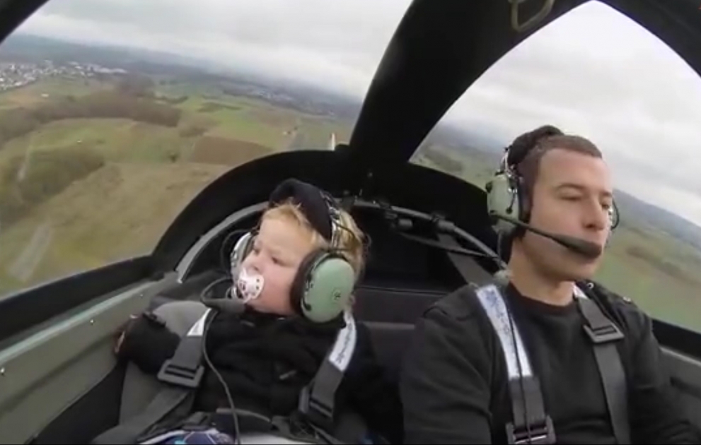 Infant`s first flight onboard a plane