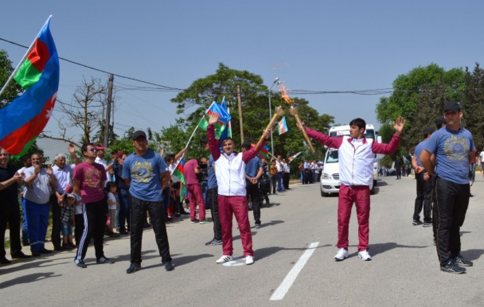 Qobustan welcomes flame of Baku 2015