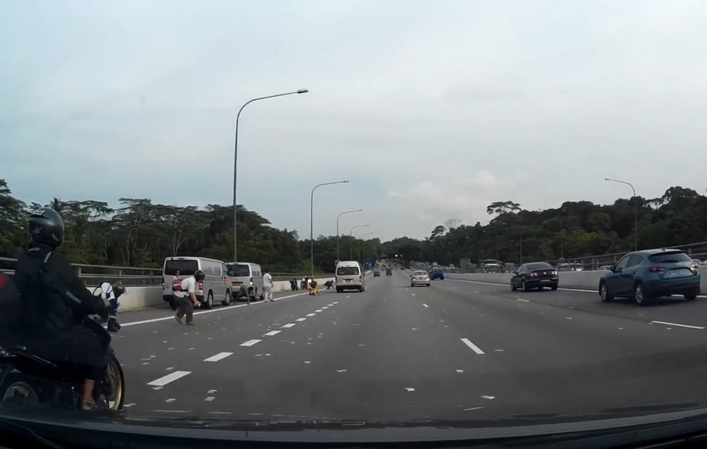 Cash spilled on Singapore Highway
