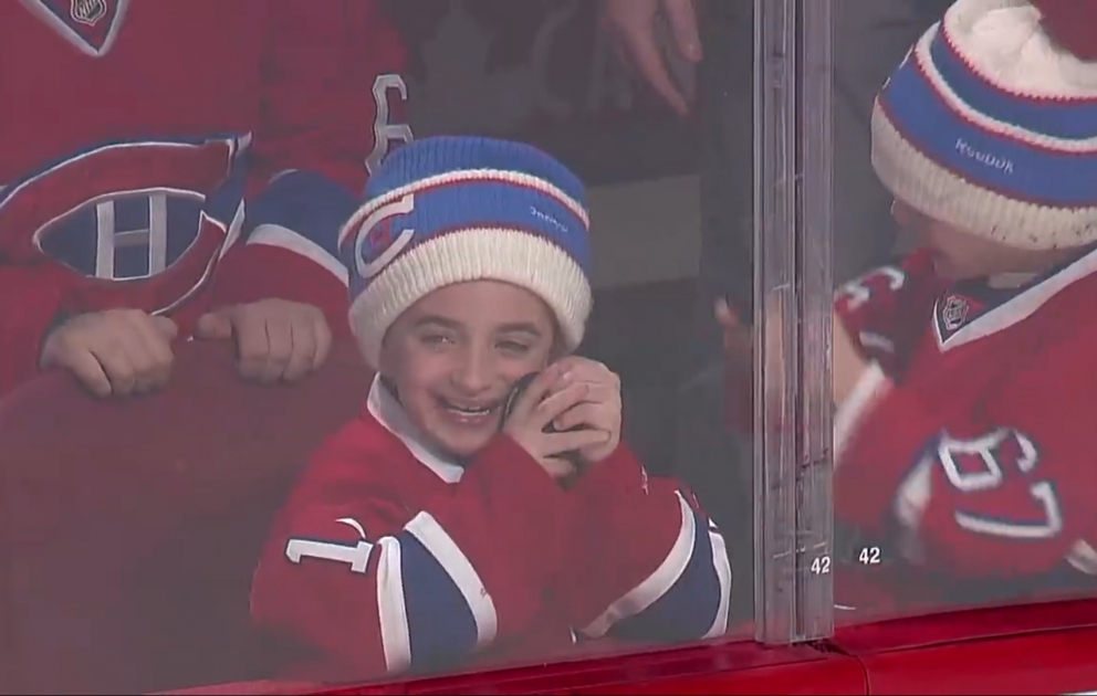 A puck makes a kid happy