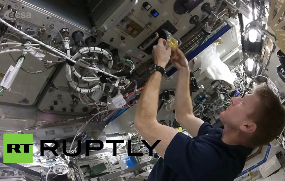Astronaut Tim Peake cooks a breakfast of scrambled eggs in space
