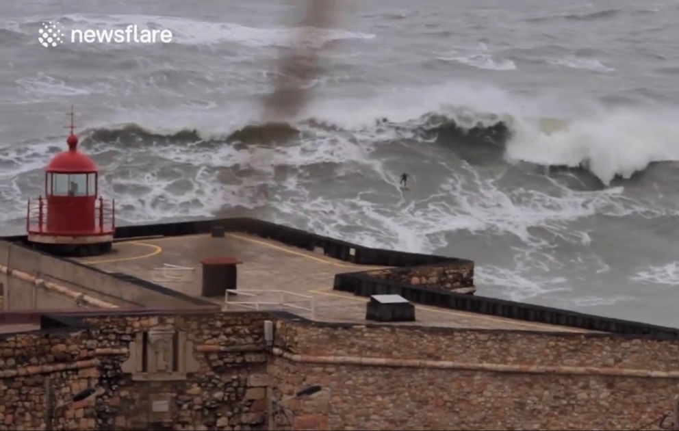 Surfer rides monster waves during storm