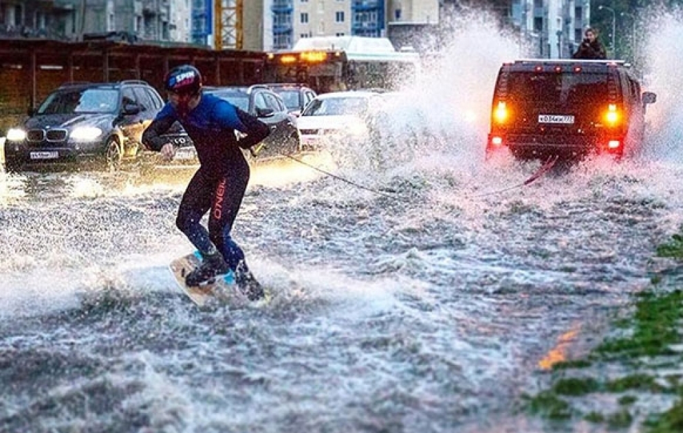 Moscow: wakeboarders take to the streets following torrental rain