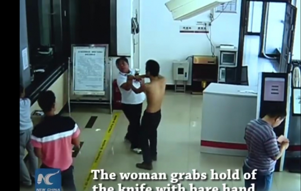 Man holds bank staff at knifepoint