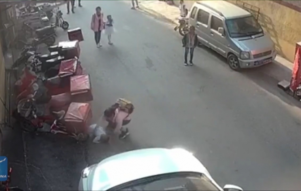 Schoolgirl tries to catch falling toddler with bare hands