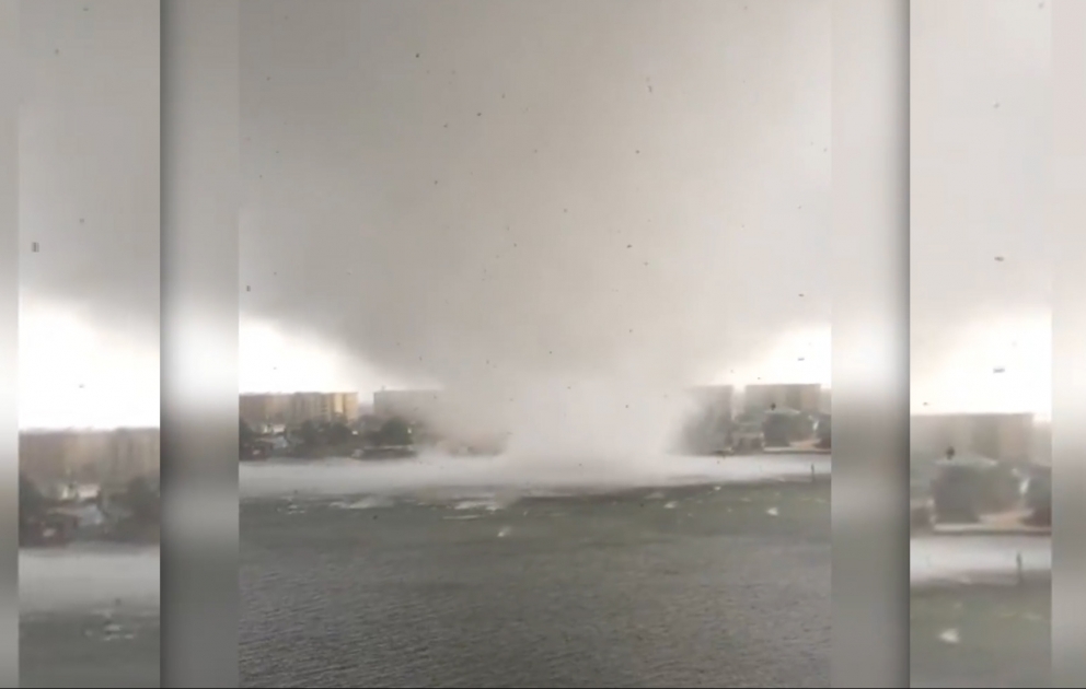 Qorxmadan tornadonu videoya çəkdi