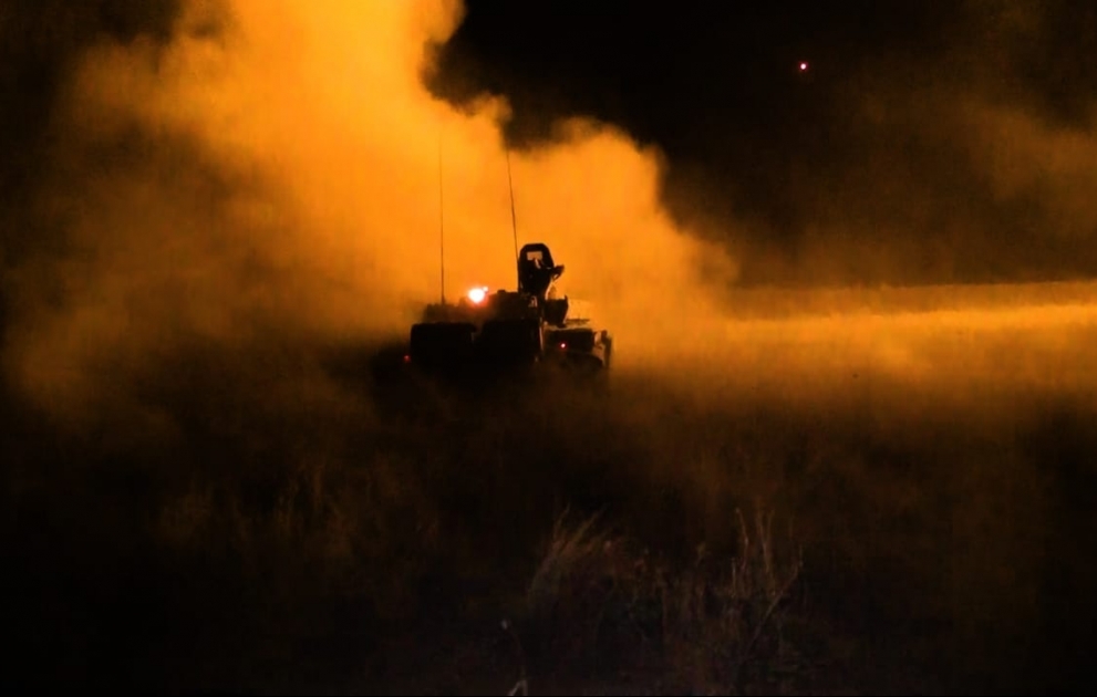 Combat firing was conducted at night in the course of large-scale exercises