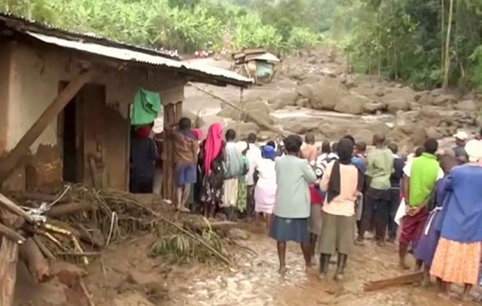 Dozens of people are killed by mudslide and falling boulders after heavy rain hits Uganda