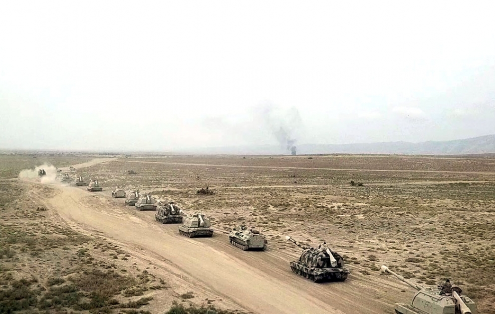 Rocket and artillery formations conduct live-fire exercises