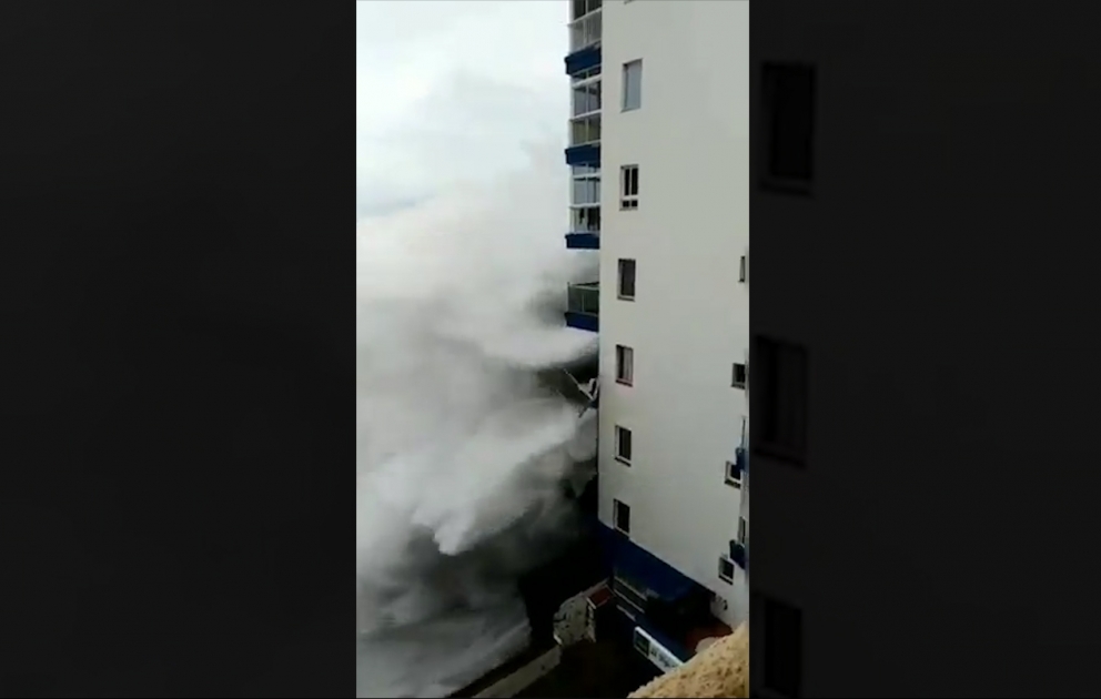 Giant waves destroy seafront balconies