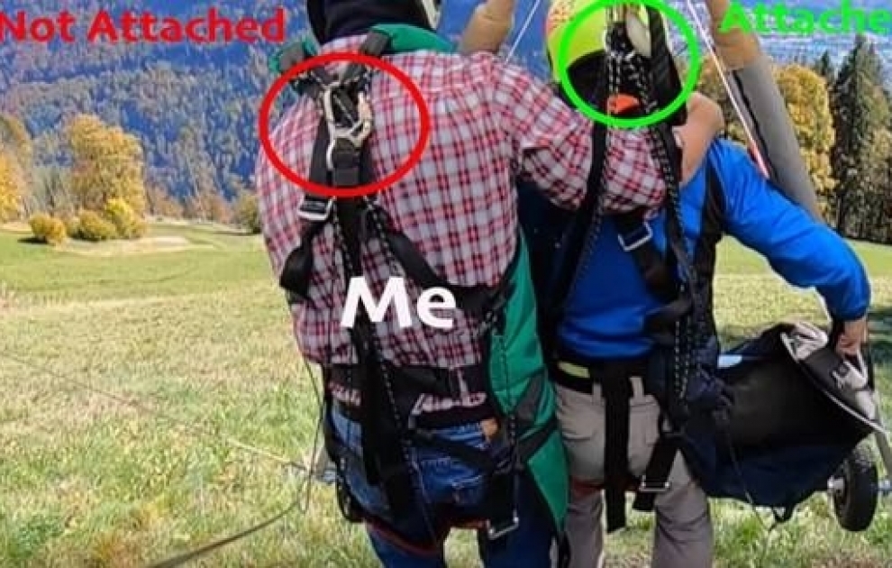 Man has near-death experience while hang gliding after pilot forgets to secure his harness