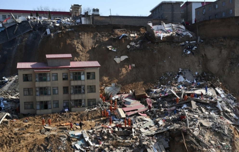 Çində yaşayış binalarının uçması nəticəsində ölənlərin sayı 15-ə çatıb