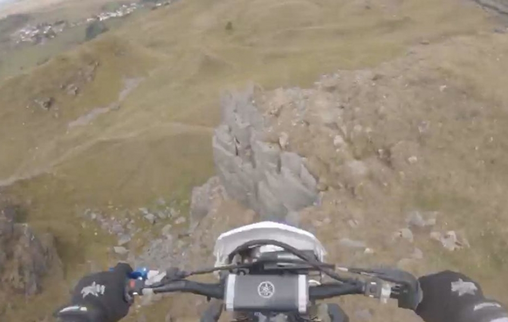 Head-cam footage captures off-road biker's horror fall straight off quarry edge in Merthyr