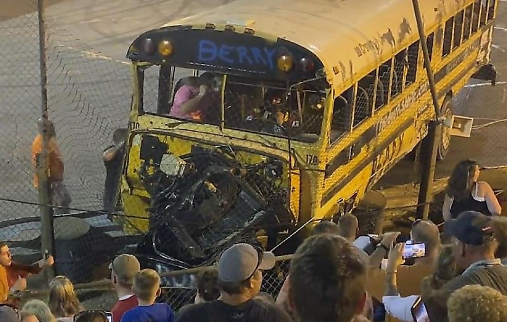 School bus crashes into fence during race