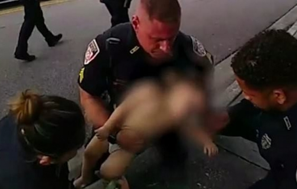 Incredible moment police officer saves life of baby who choked on cracker