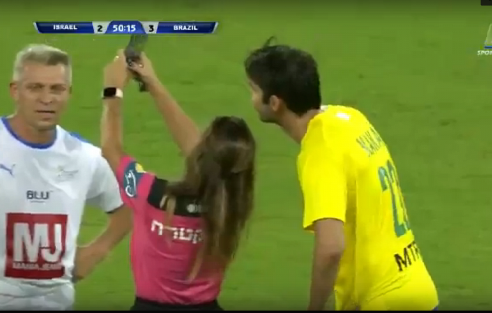 Just a referee showing Kaka a yellow card before taking a selfie with him