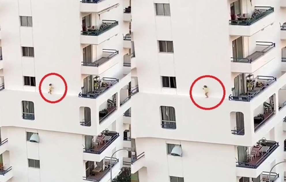 İspaniyada balaca uşağın binanın divarında gəzməsi anbaan görüntüləndi