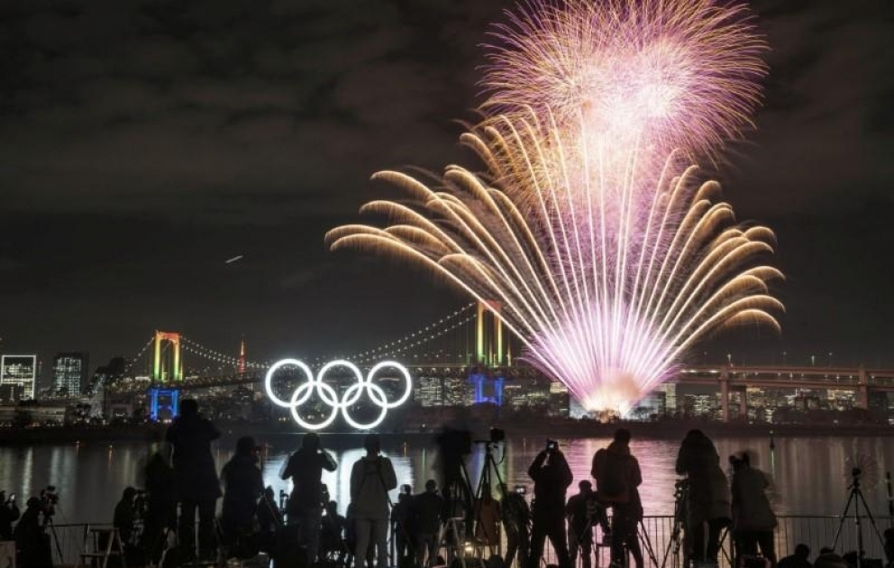 Tokyo marks six months before Olympics with fireworks display