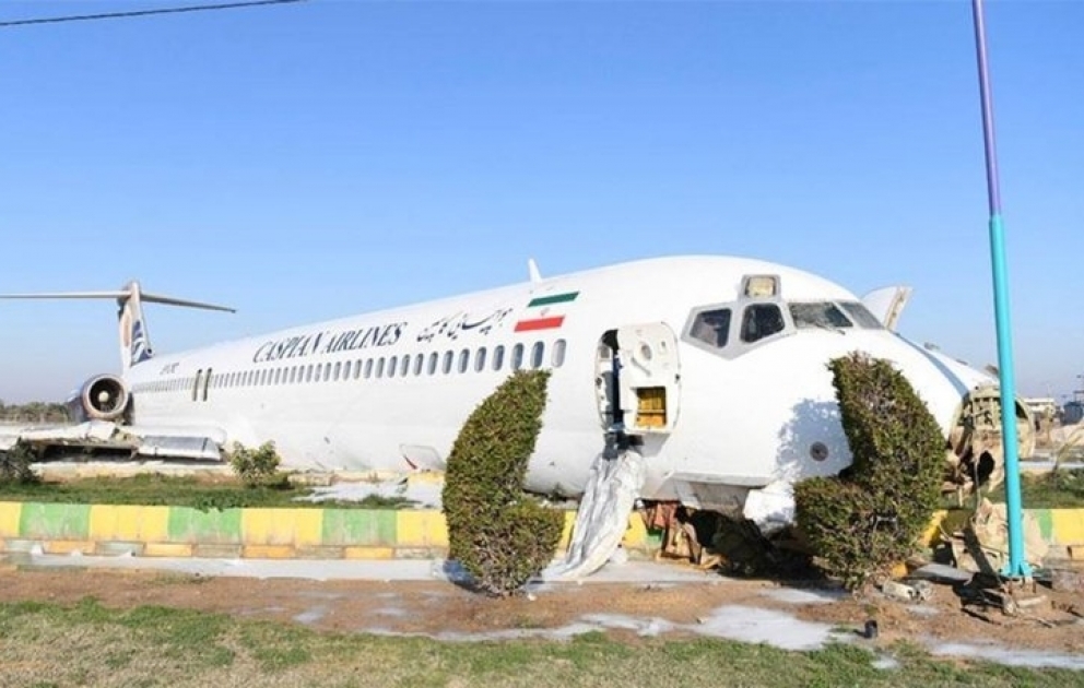 Iranian airliner skids into street