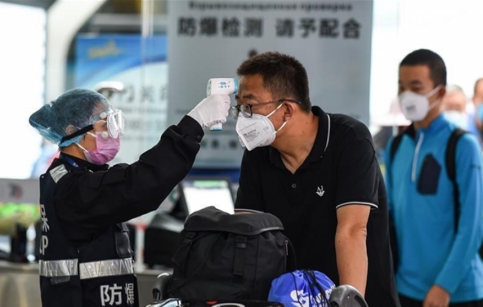 China reports 7,711 confirmed cases of novel coronavirus pneumonia, 170 deaths