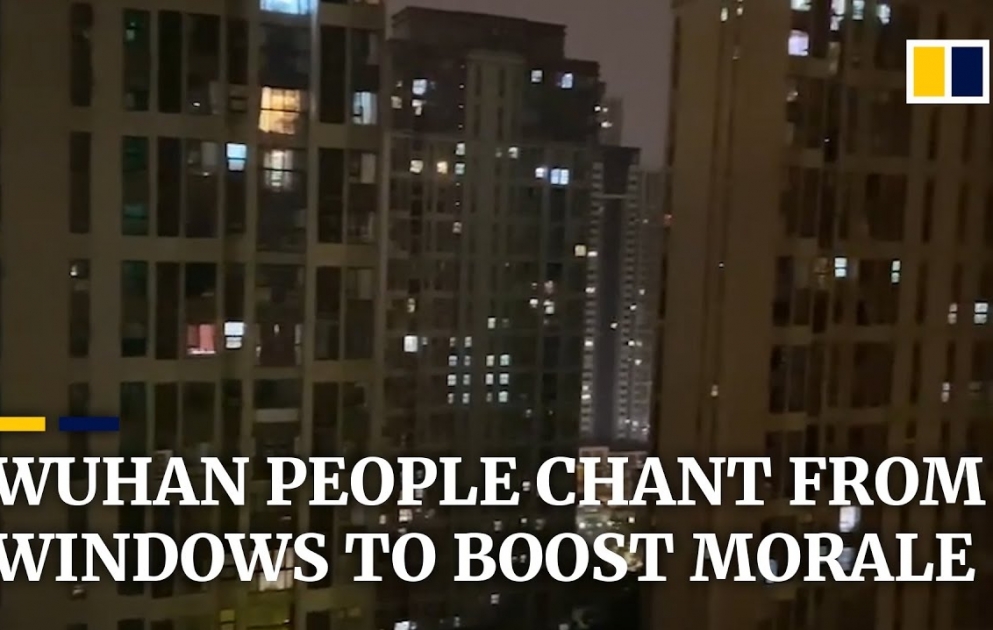 Wuhan residents chant ‘Keep it up, Wuhan’ out of their windows to boost morale