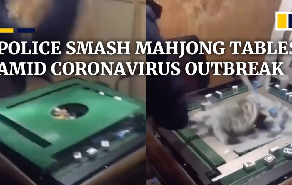 Coronavirus: Police in China smash mahjong tables to stop villagers from gathering