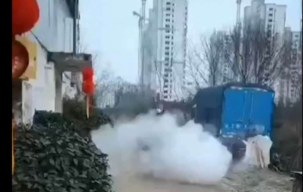 A man was spotted spraying disinfectant on self-balancing scooter in Bozhou, China.
