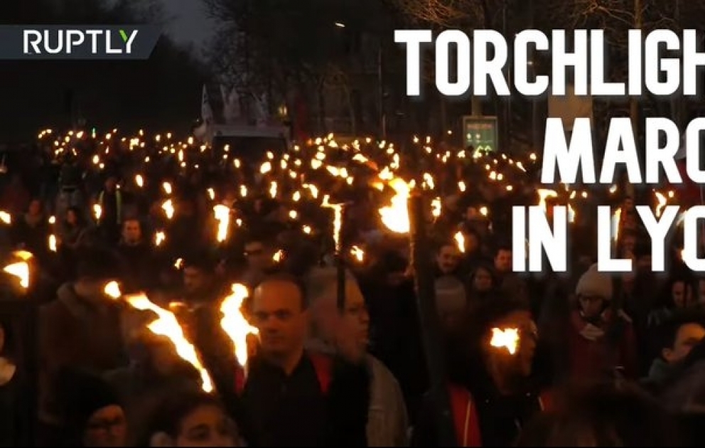Torchlight march against pension reform in