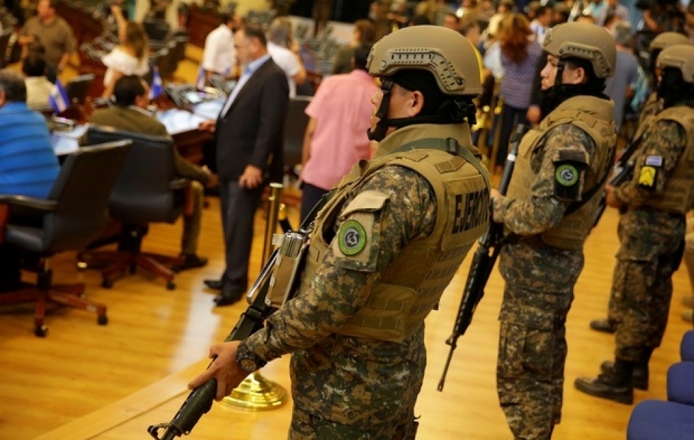 Armed soldiers enter ElSalvador’s parliament building after