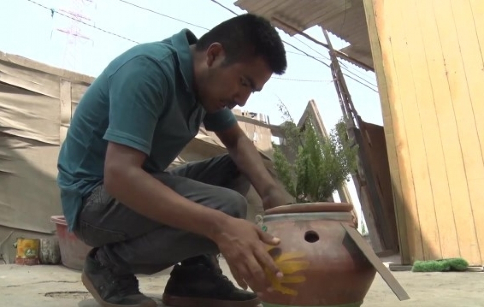 Unique clay pot lights up lives and brings energy to poor Lima neighbourhood