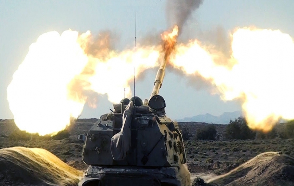 Artillery units carry out combat firing
