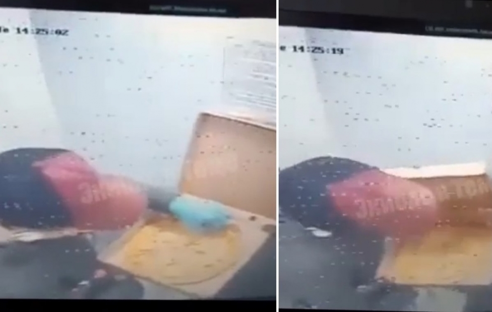 Pizza çatdıran şəxsin liftdə müştərilərin sifarişlərinin dadına baxması müşahidə kameralarına düşdü