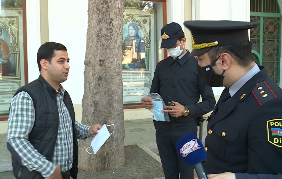 Police officers distributed masks to citizens