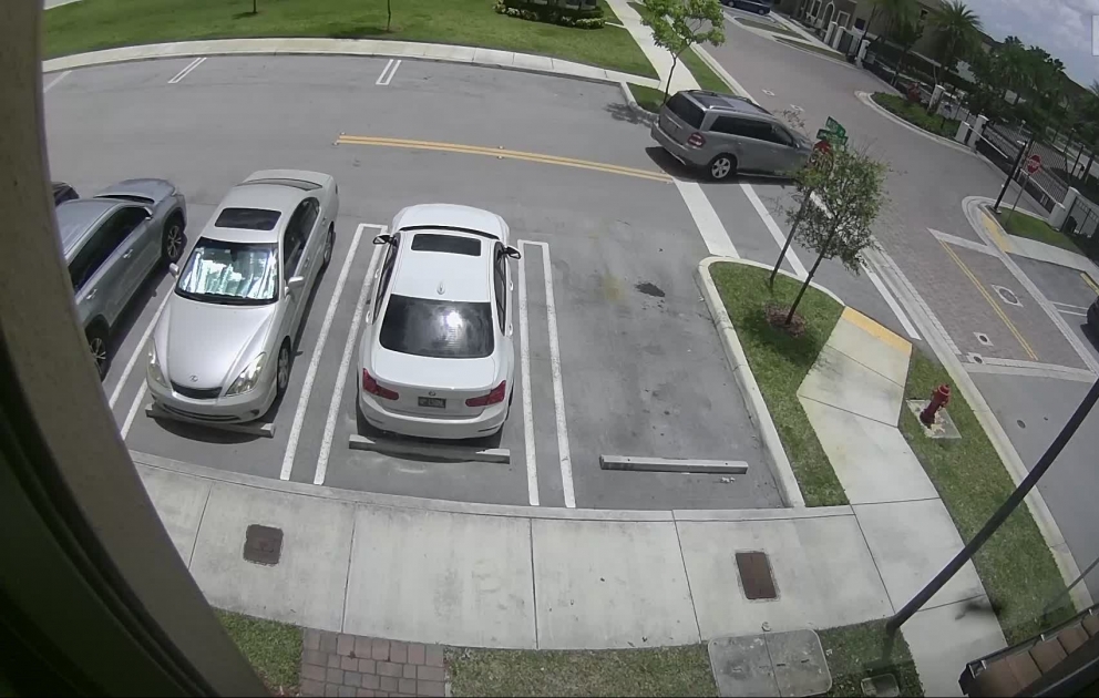 Car Speeds up and Slams Through Gate