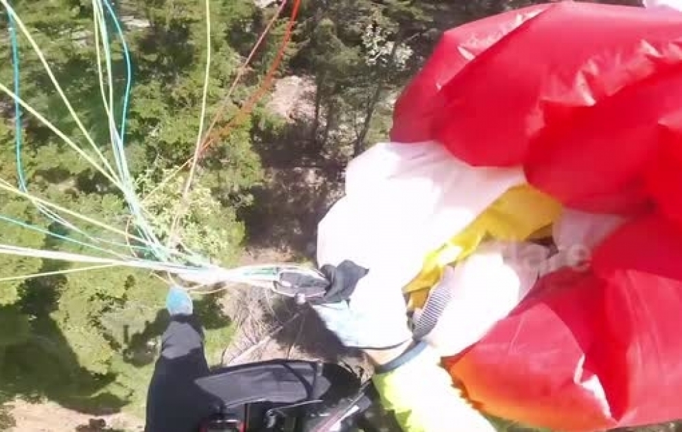 Terrifying moment two paragliders collide at nearly 5,000ft