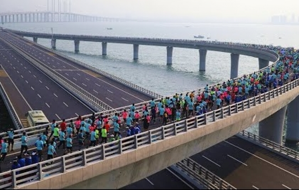 Aerial China: Ocean-view marathon on Jiaozhou Bay Bridge