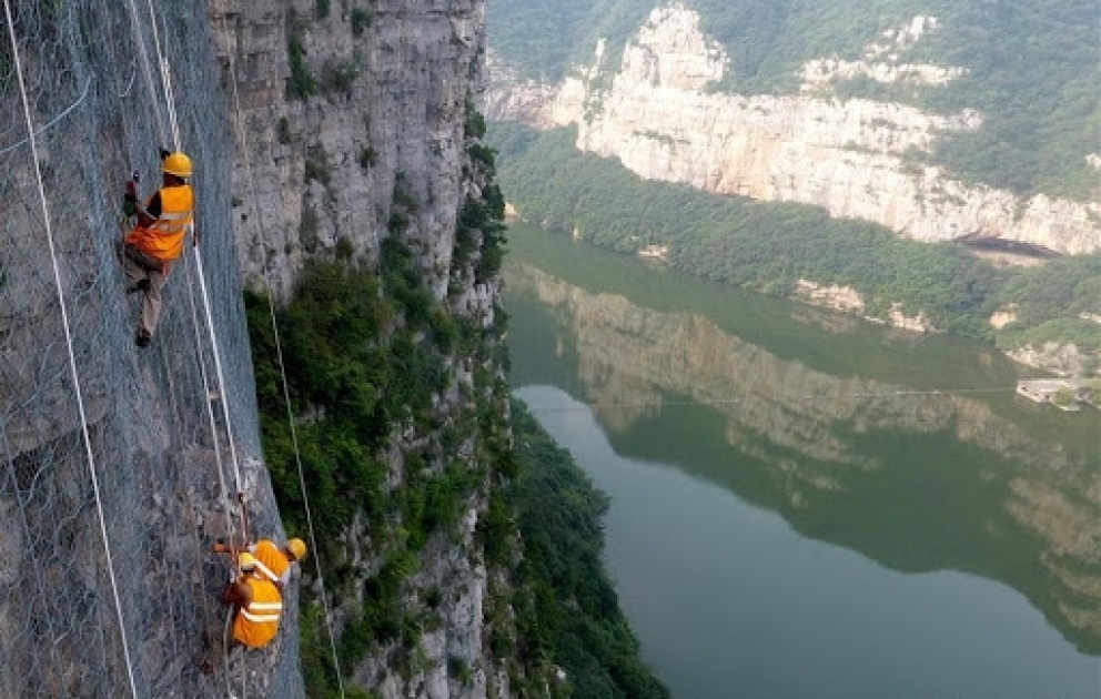 Aerial China: working on cliff