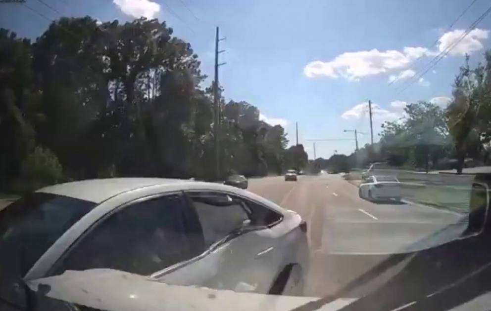 Driver was making a u-turn in the middle of the road resulting in a T-bone crash