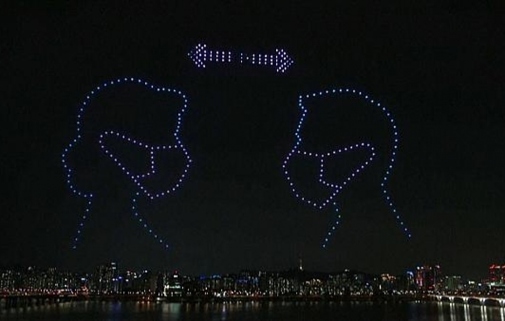 Hundreds of drones light up South Korean sky with virus messages