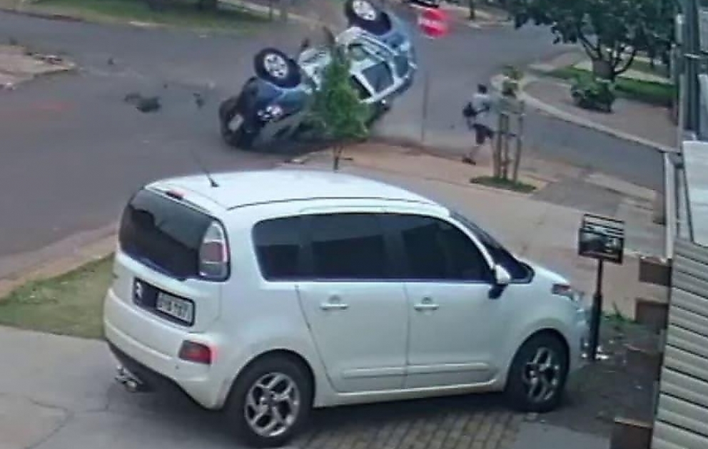 Car T Bones Police Car and Narrowly Misses Pedestrian