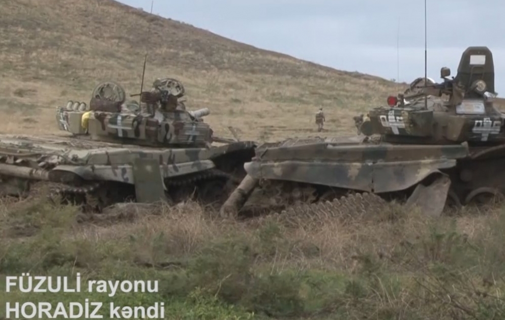 Video recording of armored vehicles left by Armenian servicemen while fleeing the liberated from occupation Horadiz village of Fizuli region