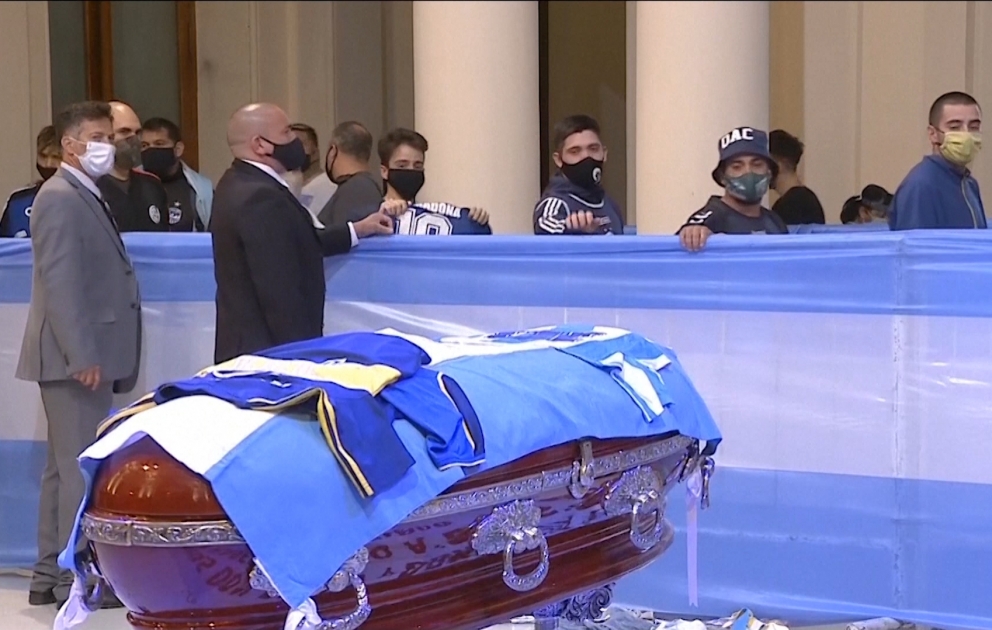 Argentine football legend Diego Maradona buried in private ceremony