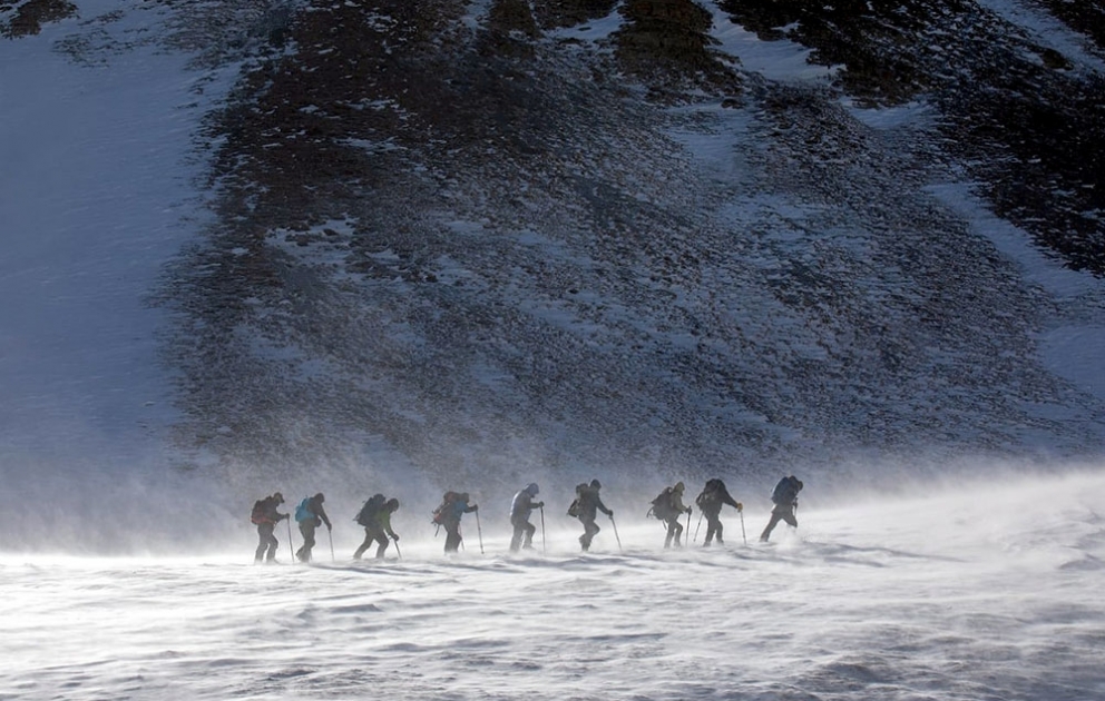 The unnamed high ground on the east of Bazarduzu peak was named "Zafar zirvesi"