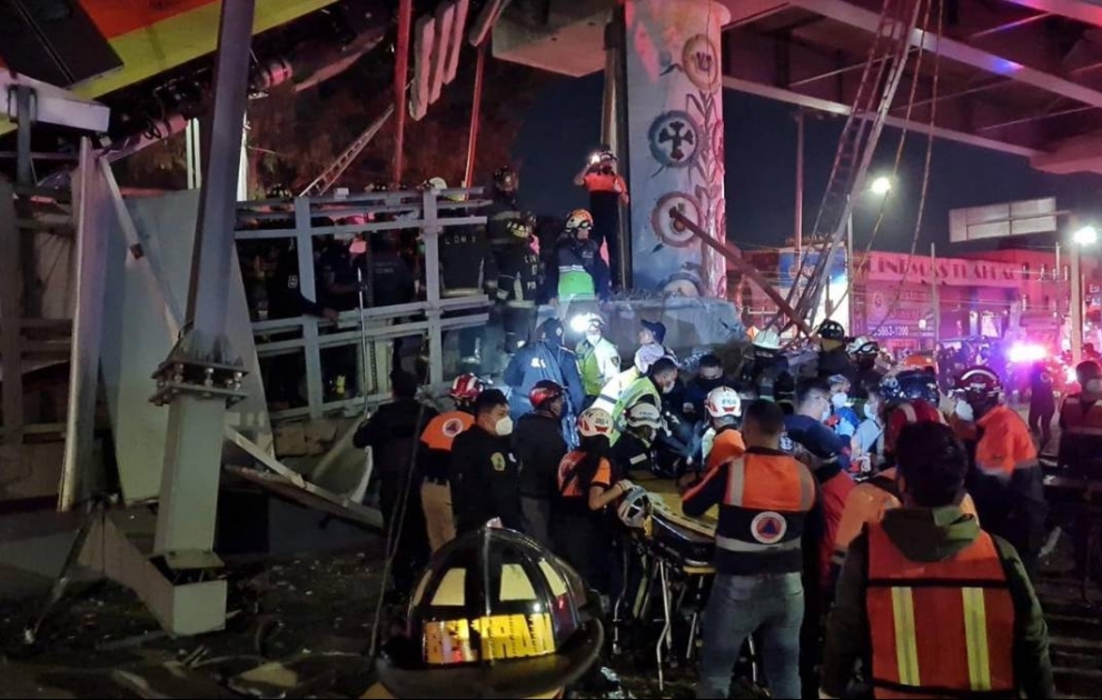 At least 15 dead, 70 injured as Mexico City metro overpass collapses onto road