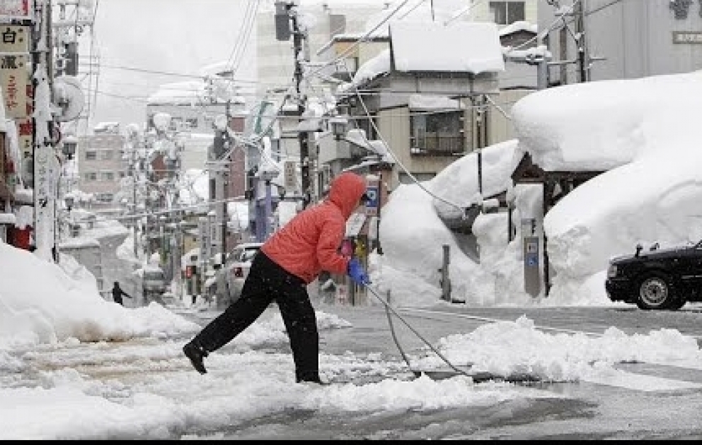 Snowstorms hit Japan`s northern Hokkaido and northeastern region of Tohoku