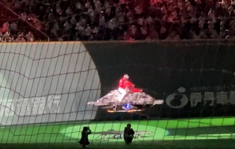 Tsuyoshi Shinjo makes grand entrance aboard hoverbike