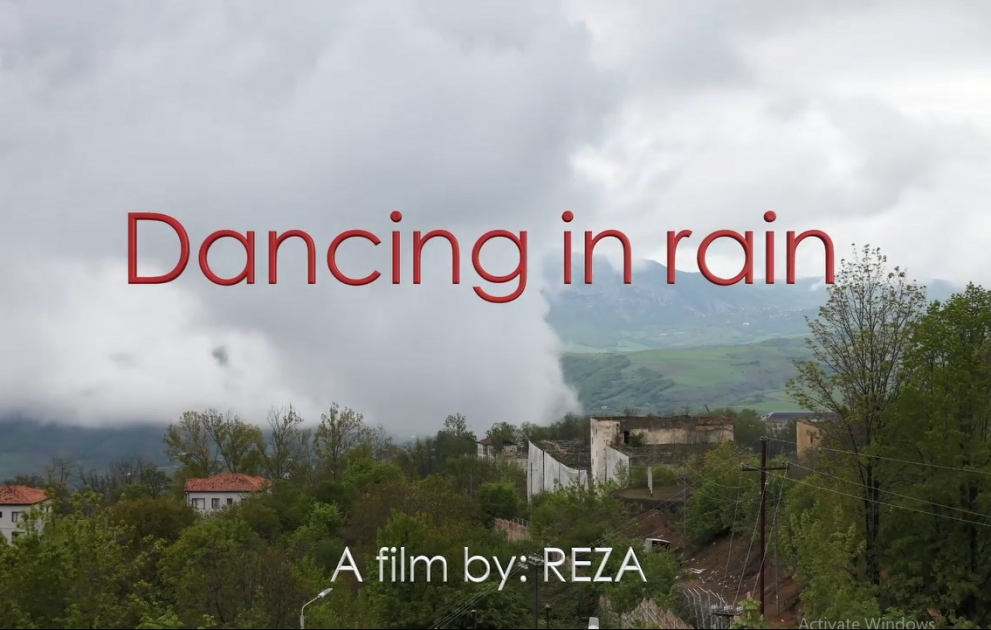 Reza Deghati: The life is back and dancing on the rain is a feeling of joy fir the people too