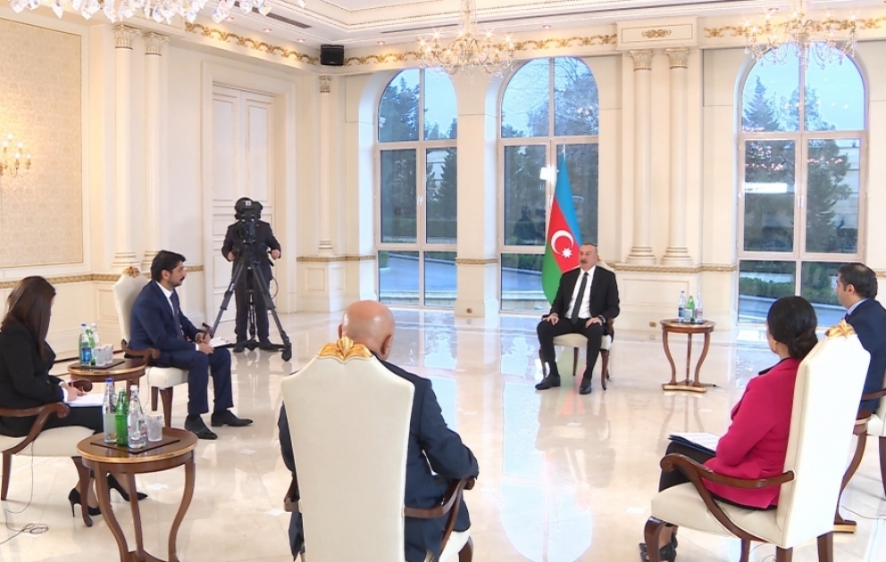 President Ilham Aliyev is being interviewed by local TV channels